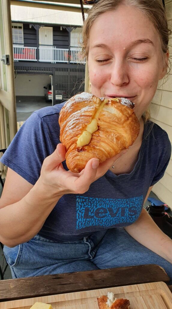 Eating a custard croissant on the balcony -- part of a truly successful morning routine...