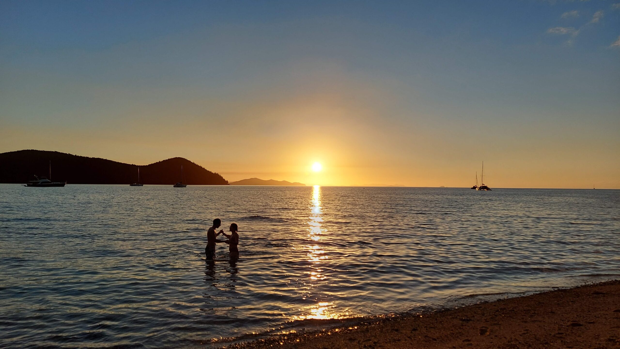 Sam and Alison in the waters at Sawmill Beach, the Whitsundays. Photo taken by Lizzie.